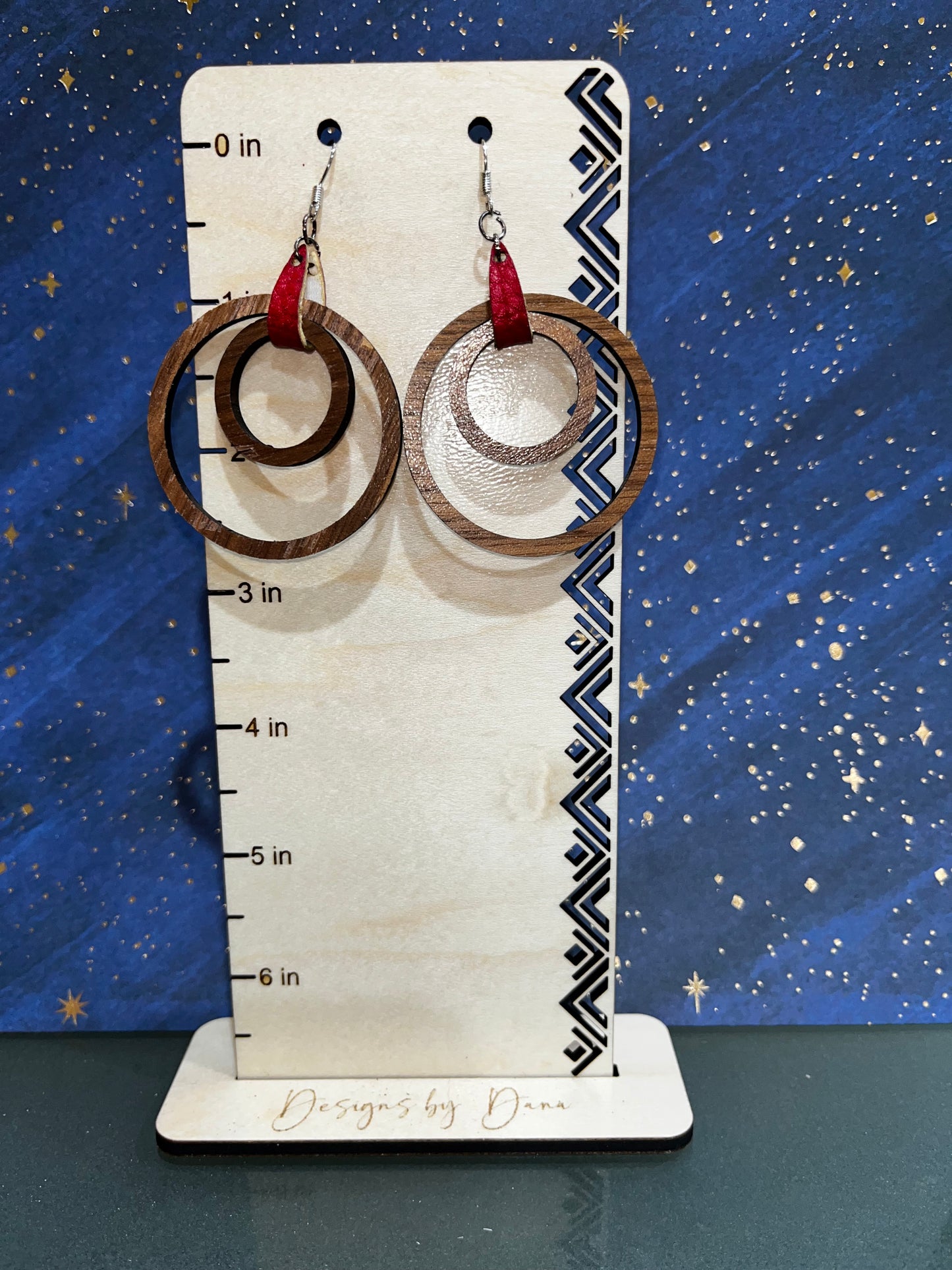 Large layered hoops with red faux leather tab