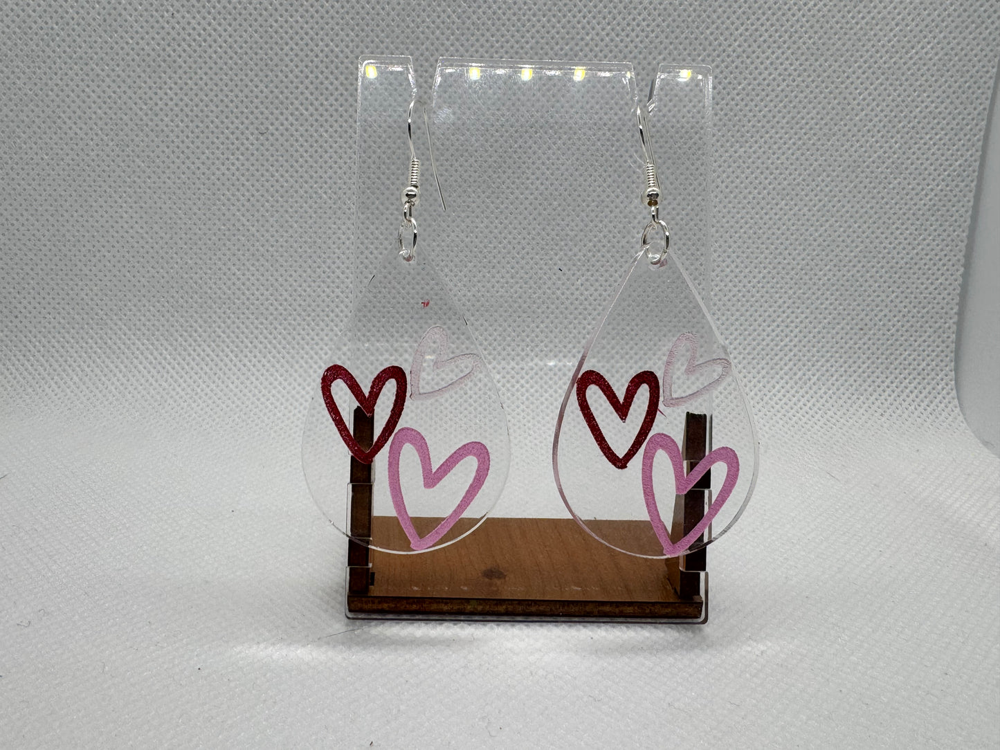Clear Acrylic dangle with pink hearts