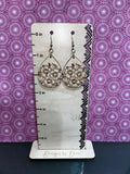 Engraved flowers on wooden teardrop earring