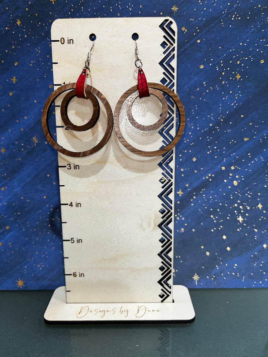 Large layered hoops with red faux leather tab