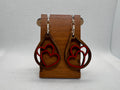 Wooden dangle earring with two hearts